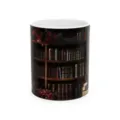 Detailed view of white ceramic coffee mug featuring a vintage bookshelf pattern and red flowers. - Style 17
