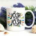 Ceramic coffee mug detail, white cup with colorful splash print and custom text design. - Custom Name Letter Print
