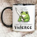 Close-up detail of a ceramic coffee mug with funny frog knife meme print, perfect office cup. - Style 4
