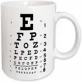 White ceramic mug featuring a classic eye chart print design, ideal for daily coffee or tea use. - Style 6