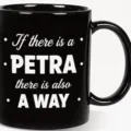 Black ceramic coffee mug with German quote text print, ideal for office and home use daily. - 11OZ / Black
