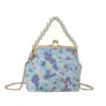 Sac à main vintage fleuri avec poignée en perles et chaîne dorée élégante pour femme. - Bleu