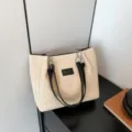 Sac cabas en paille tissée d'été pour femmes, sac à bandoulière de plage décontracté en cuir noir. - Noir