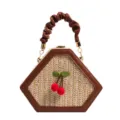 Sac à main en paille tressée avec poignée en cuir marron et adorable décor cerise, style élégant. - Marron