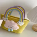 Cute woven bucket bag with rainbow handle and pink plush cloud charm for sweet daily styles. - Yellow