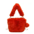 Orange plush crossbody bag for women, stylish fluffy shoulder bag with chain strap and cute pompom. - Orange