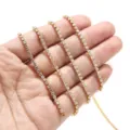 Detail view of golden rhinestone cup chain for DIY jewelry making, 2.5mm claw chain. - 2.5mm / Gold