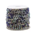 Detailed view of colorful crystal beaded chain on spool for DIY handmade necklace jewelry making. - Gold Multi-color Blue Chain