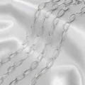Close-up detail of polished stainless steel oval link chains on silky satin background. - 1m / Steel Color Oval Chain