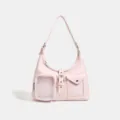 Detalle de bolso de hombro ita de cuero PU rosa con bolsillo transparente y hebilla. - Rosa