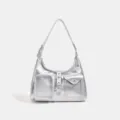 Silver metallic shoulder bag detail, transparent pocket design, stylish daily accessory. - Silver