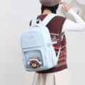 Hellblauer Casual Schulrucksack mit Sichtfenster, grosser Kapazitaet fuer den Alltag. - Blau