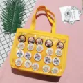 Bolso tote de lona amarilla con ventana de PVC transparente y pines de personajes de anime. - Naranja