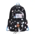 Mochila escolar negra con estampado de estrellas y nubes y bolsillo frontal para niñas. - Negro