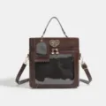 Brown PU leather ita bag with clear display window, heart embroidery and adjustable shoulder strap. - With Support Plate Convertible Style / Brown