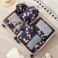 7-piece travel packing cubes set, floral pattern luggage organizers and toiletry bags. - Navy Maple Leaf