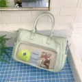 Estiloso bolso ita de gran capacidad con ventana frontal transparente color verde - Verde