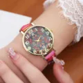 Close-up of retro ethnic bohemian style watch dial and colorful canvas strap on wrist. - Style G