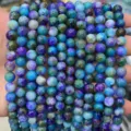 Vue detaillee de perles rondes en pierres precieuses colorees pour bijoux de bricolage. - Bleu Étoilé Optimisé