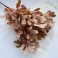 Artificial money leaf plant bundle fake branches for home wedding showroom decor 9 forks - Orange