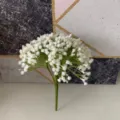 Close-up view of artificial baby breath flower bunch with white petals and green stems. - Style B