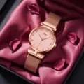 Reloj de cuarzo oro rosa para mujer con correa de malla magnética y esfera floral elegante. - Rosa