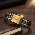 Detail view of men's rectangular quartz watch with champagne dial and metallic strap. - Gold Dial Men