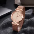 Rose gold quartz watch for women with magnetic mesh strap, cute bow charm and floral dial. - Apricot