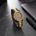 Reloj de cuarzo para mujer de aleación con pedrería, vista detallada de esfera estrellada. - Bicolor Negro Dorado