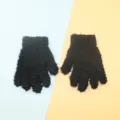 Detailed shot of black fuzzy knitted winter gloves for kids, soft and warm texture. - Black