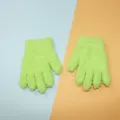 Close-up of bright green fluffy knit gloves showing soft texture and detailed stitching. - Green