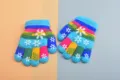 Colorful knitted gloves for kids, cozy five-finger winter warm gloves with cute snowflake patterns. - One Size / Small Blue