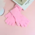 Women's fuzzy pink fingerless gloves, cozy winter knit half-finger mitten design. - Pink