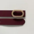 Burgundy PU leather women's belt with gold-tone oval buckle, stylish waistband variant. - Dark Red