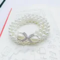 Women's multi-strand faux pearl waist chain elastic rhinestone bow dress belt accessory - X2 Pearls