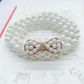 Women elastic multi-strand faux pearl waist belt with gold bow knot dress clothing accessory. - C-Bowknot