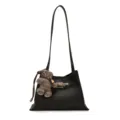 Black leather shoulder bag with chic metal lock closure and cute tweed bear charm detail. - Shoulder Bag (Without Pendant) / Black