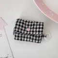 Borsa per auricolari in tessuto a quadri bianco e nero stile INS custodia portatile con bottone - Quadri Neri