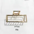 Golden geometric rectangular alloy hair claw clip, stylish minimalist hair accessory for women. - 7cm / Gold