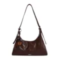 Detailed view of the brown leather shoulder bag, hobo style with chic beaded charms. - With Pendant / Brown