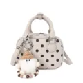 Trendy beige polka dot suede bowling shoulder bag with cute gnome keychain accessory. - With Pendant / White