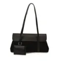 Detailed view of the black retro shoulder underarm bag showcasing suede texture, strap, and small pouch. - Black