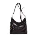 Dark brown leather hobo shoulder bag with adjustable strap, metal rings and beaded charm. - With Pendant / Dark Coffee