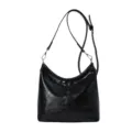 Black minimalist hobo shoulder bag for women, casual PU leather dumpling bag variant. - No Pendant / Black