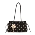 Black polka dot shoulder bag detail showing stylish commuting design, large capacity and cute pendant. - With Pendant / Black
