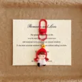 Cute cartoon little girl keychain bag charm with red hat and plaid dress for students. - Red
