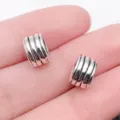 Silver ribbed metal charm bead, DIY bracelet jewelry accessory variant, polished finish. - Round Striped Large Hole Bead (10102)