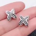 Silver four pointed star alloy charm bead for DIY European bracelets jewelry making accessories. - Bowknot Four-Leaf Clover Large Hole Bead (10103)