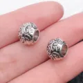 Silver tone alloy large hole beads with swirl pattern, ideal for DIY charm bracelets. - Antique Silver Cloud Pattern Heart Large Hole Bead (8820)