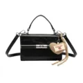 Black PU leather shoulder handbag with top handle and cute heart knit charm for women. - Black without Pendant